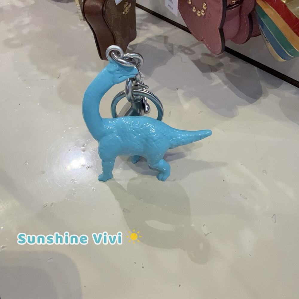 NWT Coach CEB62 Keychain Brachiosaurus dinosaur Bag Charm Silver /blue dust bag